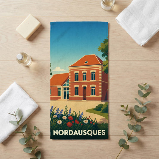 Serviette de bain souvenir de la ville de Nordausques avec une illustration stylisée d'un bâtiment traditionnel.
