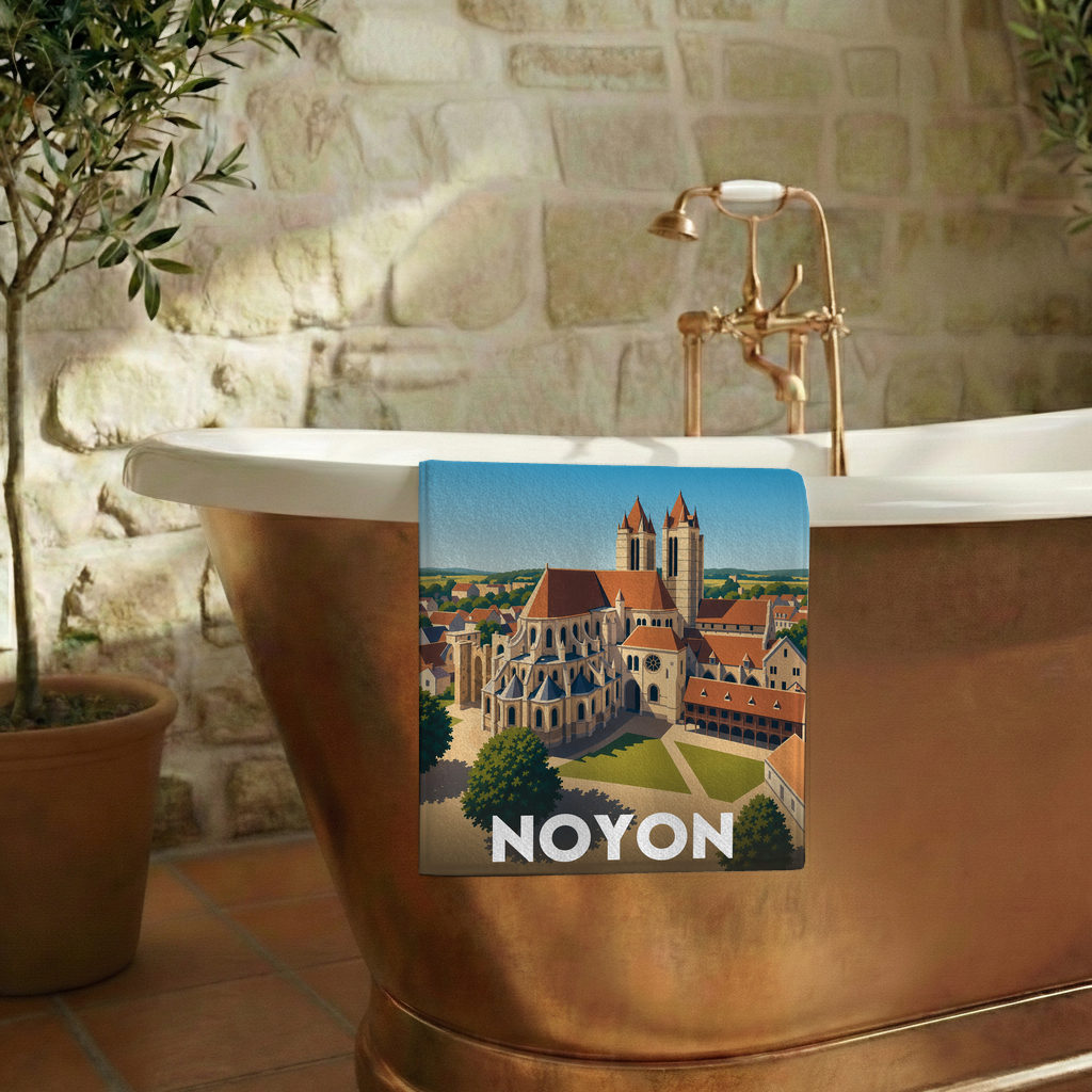 Serviette de bain souvenir de la ville de Noyon avec une illustration stylisée.