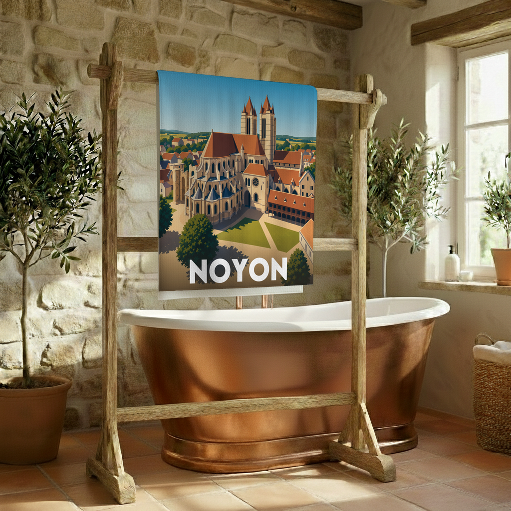 Serviette de bain souvenir de la ville de Noyon avec une illustration stylisée.