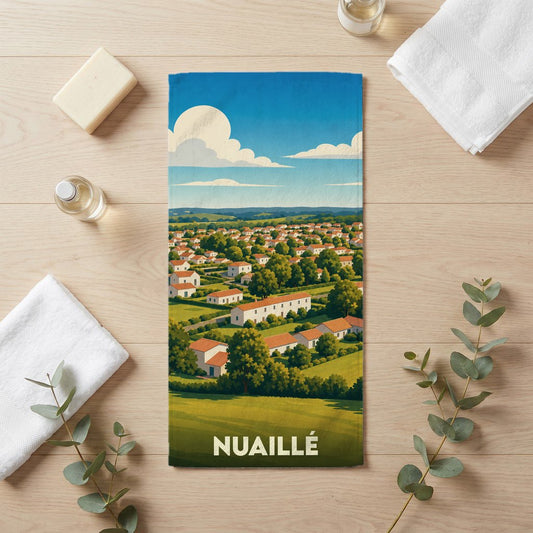 Serviette de bain souvenir de la ville de Nuaillé avec une illustration stylisée d'un paysage de campagne.
