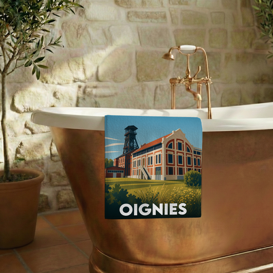 Serviette de bain souvenir de la ville de Oignies avec une illustration stylisée.