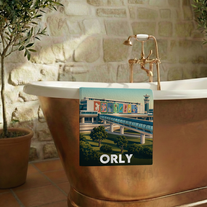 Serviette de bain souvenir de la ville de Orly avec une illustration stylisée.
