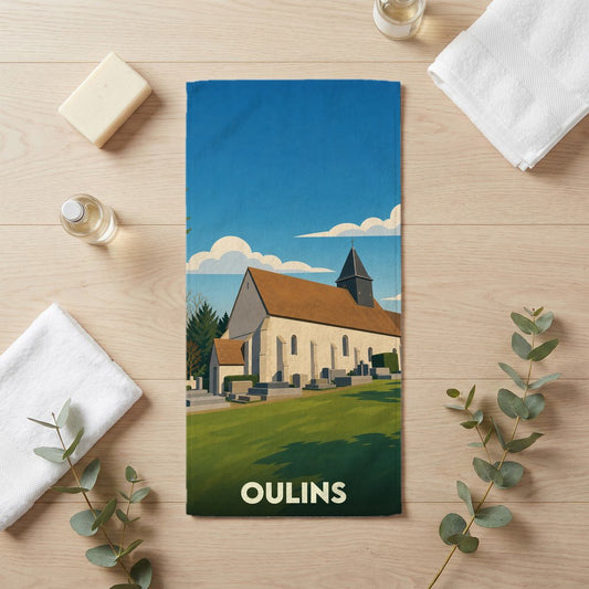 Serviette de bain souvenir de la ville d'Oulins avec une illustration stylisée de son église.