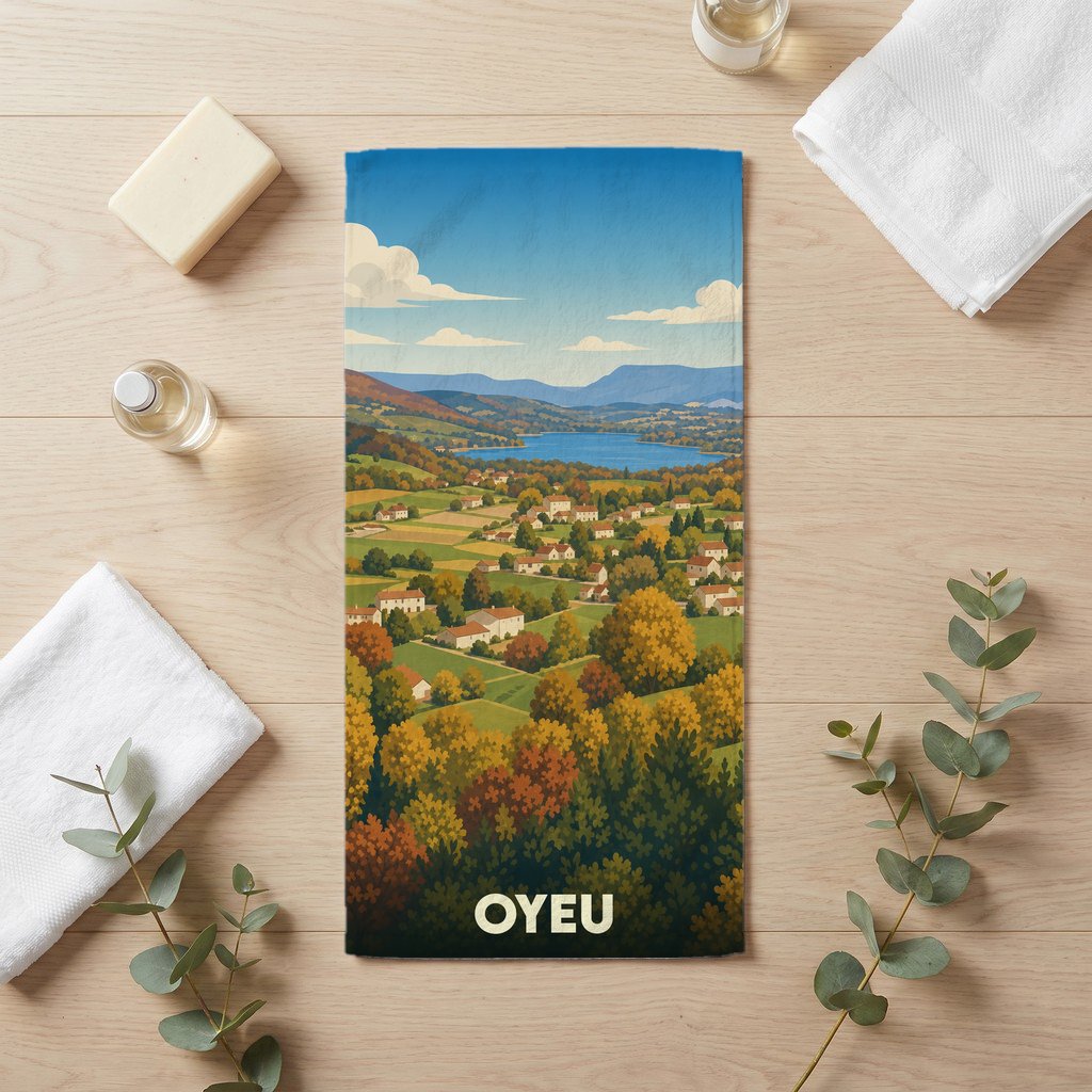 Serviette de bain souvenir de la ville d'Oyeu avec une illustration stylisée de son paysage vallonné.