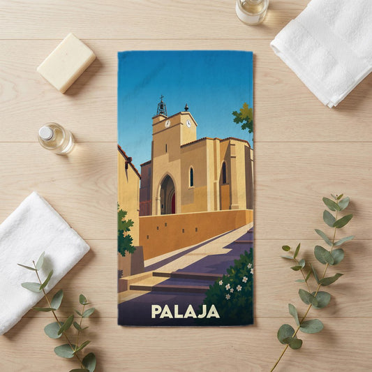 Serviette de bain souvenir de la ville de Palaja avec une illustration stylisée de son église.