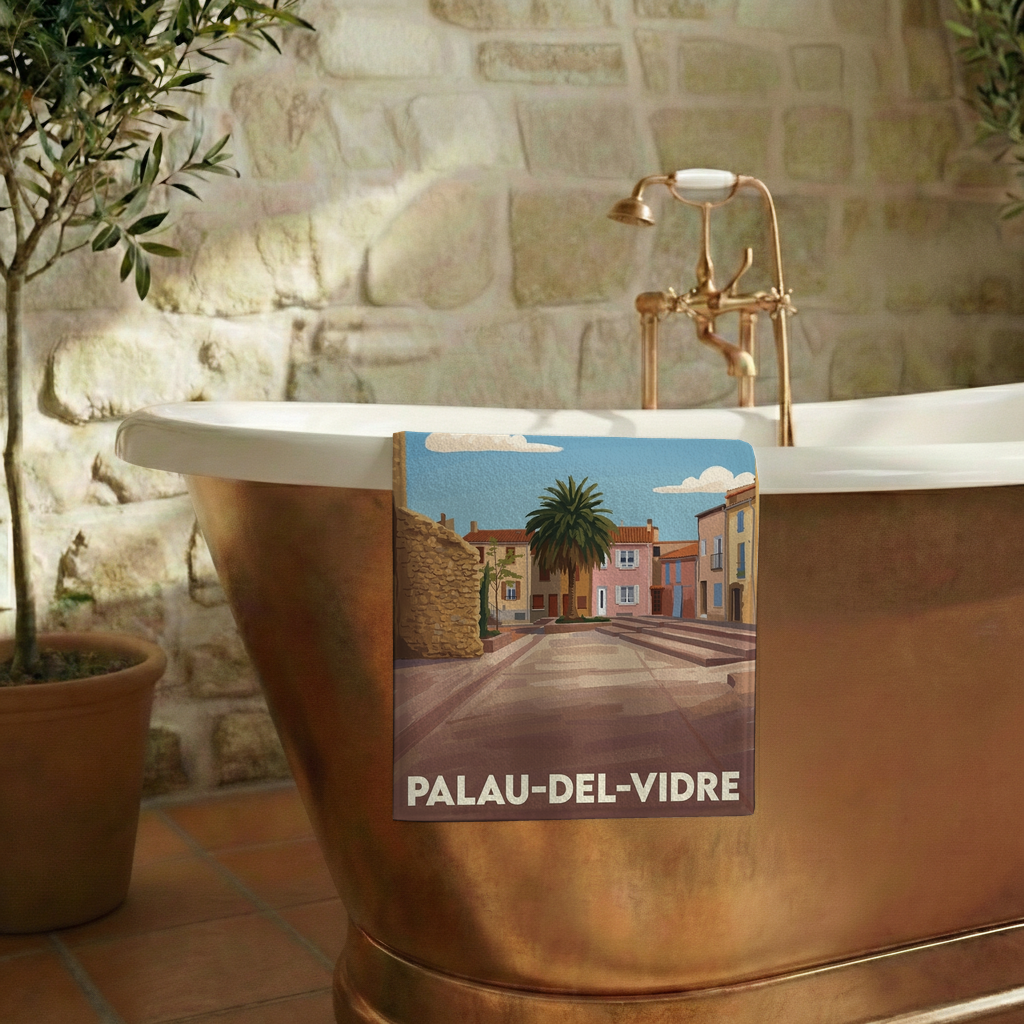 Serviette de bain souvenir de la ville de Palau-del-Vidre avec une illustration stylisée.