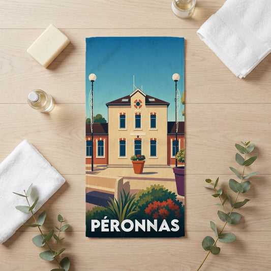 Serviette de bain souvenir de la ville de Péronnas avec une illustration stylisée de sa gare.