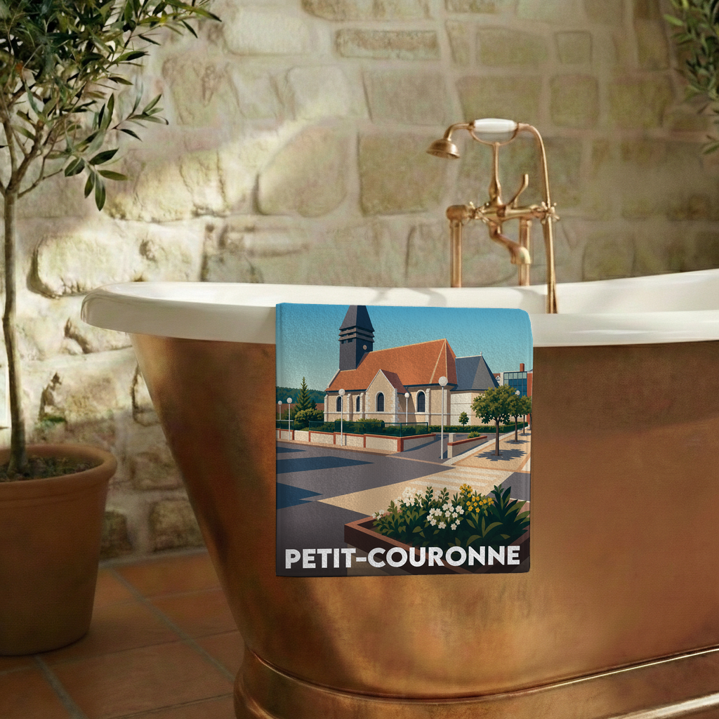Serviette de bain souvenir de la ville de Petit-Couronne avec une illustration stylisée.