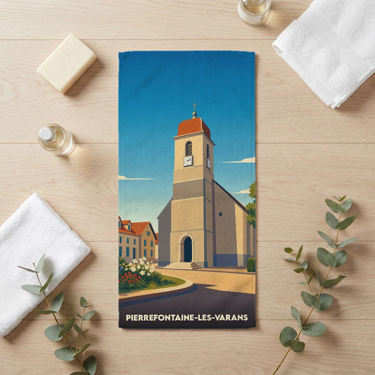 Serviette de bain souvenir de la ville de Pierrefontaine-les-Varans avec une illustration stylisée de son église.