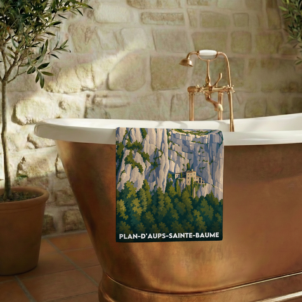 Serviette de bain souvenir de la ville de Plan-d'Aups-Sainte-Baume avec une illustration stylisée du paysage.