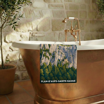 Serviette de bain souvenir de la ville de Plan-d'Aups-Sainte-Baume avec une illustration stylisée du paysage.