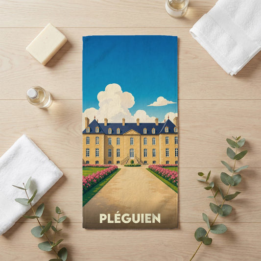Serviette de bain souvenir de la ville de Pléguien avec une illustration stylisée d'un château.