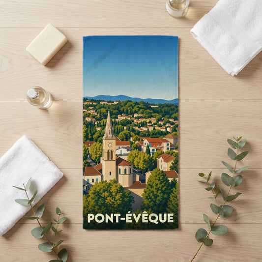 Serviette de bain souvenir de la ville de Pont-Évêque avec une illustration stylisée.