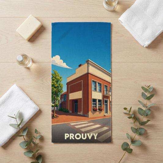 Serviette de bain souvenir de la ville de Prouvy avec une illustration stylisée d'un bâtiment urbain.