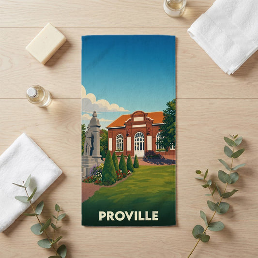 Serviette de bain souvenir de la ville de Proville illustrée avec son architecture locale.