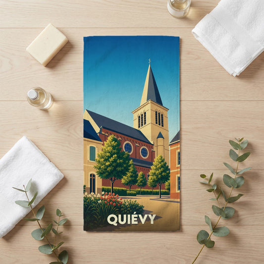Serviette de bain souvenir de la ville de Quiévy avec une illustration stylisée de son église.