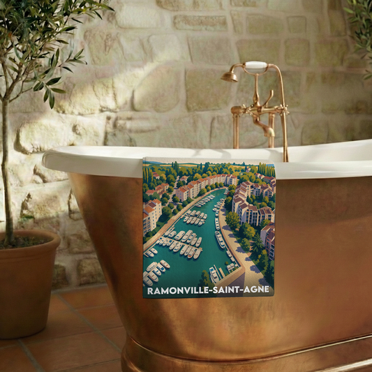 Serviette de bain souvenir de la ville de Ramonville-Saint-Agne avec une illustration stylisée.