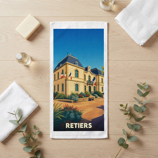 Serviette de bain souvenir de la ville de Retiers avec une illustration stylisée d'un bâtiment officiel.
