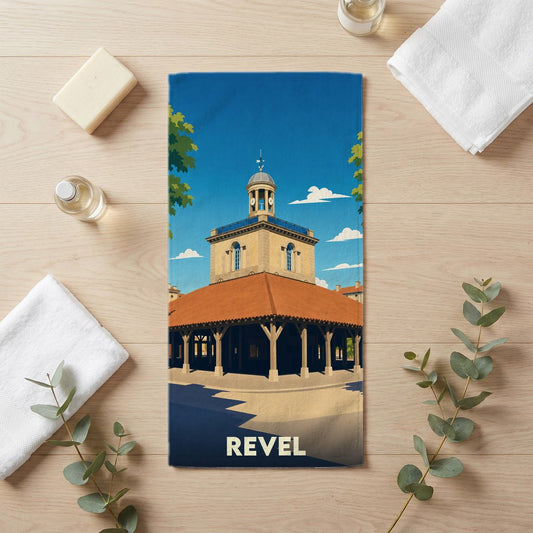 Serviette de bain souvenir de la ville de Revel avec une illustration stylisée de sa halle centrale.