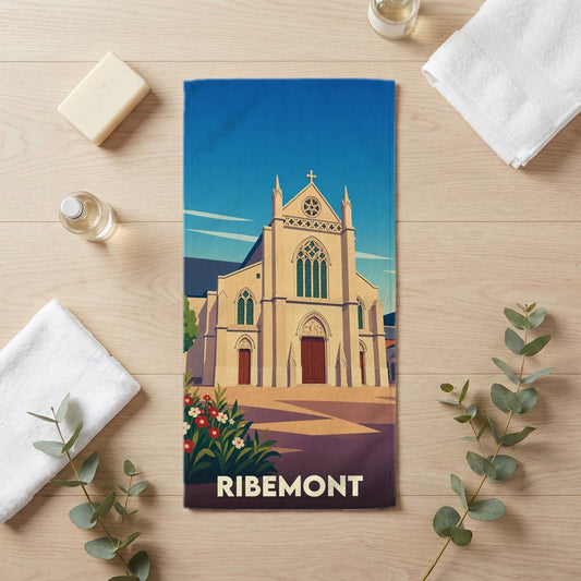 Serviette de bain souvenir de la ville de Ribemont avec une illustration stylisée de son église.