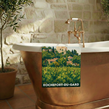 Serviette de bain souvenir de Rochefort-du-Gard avec une illustration stylisée de son paysage provençal.