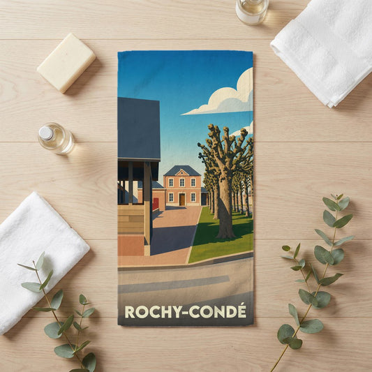 Serviette de bain souvenir de la ville de Rochy-Condé avec une illustration stylisée.