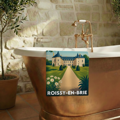 Serviette de bain souvenir de la ville de Roissy-en-Brie avec une illustration stylisée d'un château.