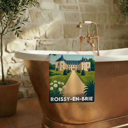Serviette de bain souvenir de la ville de Roissy-en-Brie avec une illustration stylisée d'un château.
