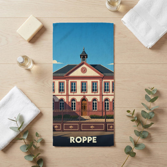 Serviette de bain souvenir de la ville de Roppe avec une illustration stylisée de son bâtiment emblématique.