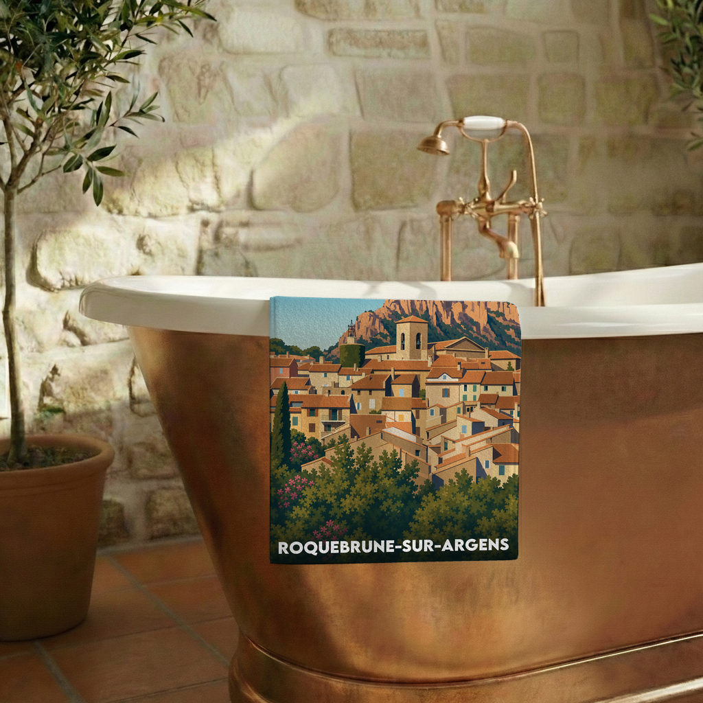 Serviette de bain souvenir de la ville de Roquebrune-sur-Argens avec une illustration stylisée.