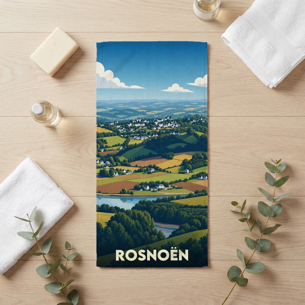 Serviette de bain souvenir de la ville de Rosnoën avec une illustration de paysage champêtre.