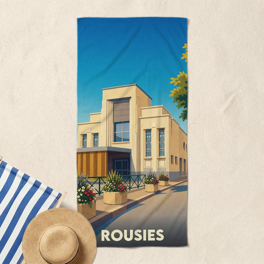 Serviette de bain souvenir de la ville de Rousies avec une illustration stylisée de son architecture.