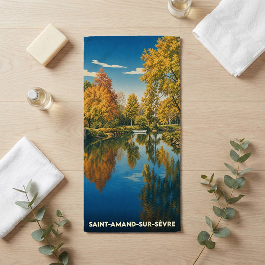 Serviette de bain souvenir de Saint-Amand-sur-Sèvre illustrée d'un paysage d'automne se reflétant dans une rivière.