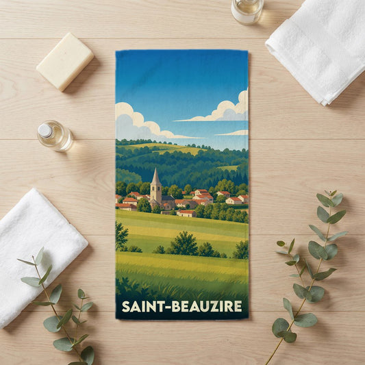 Serviette de bain souvenir de la ville de Saint-Beauzire illustrée par un paysage champêtre stylisé.
