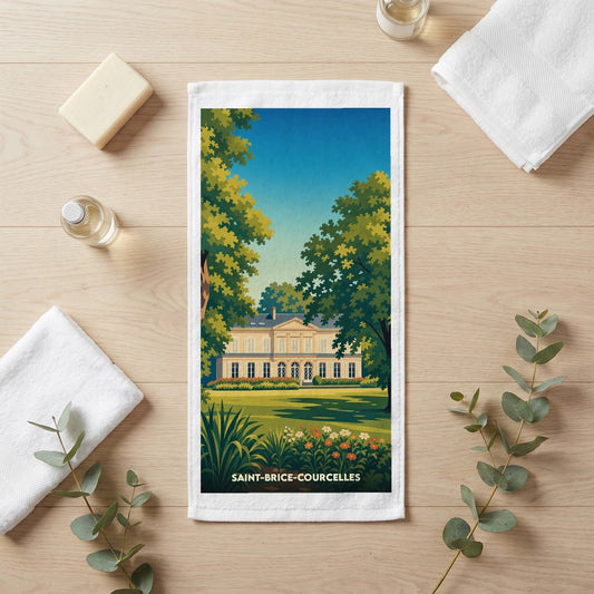Serviette de bain souvenir de la ville de Saint-Brice-Courcelles avec une illustration stylisée d'un château.