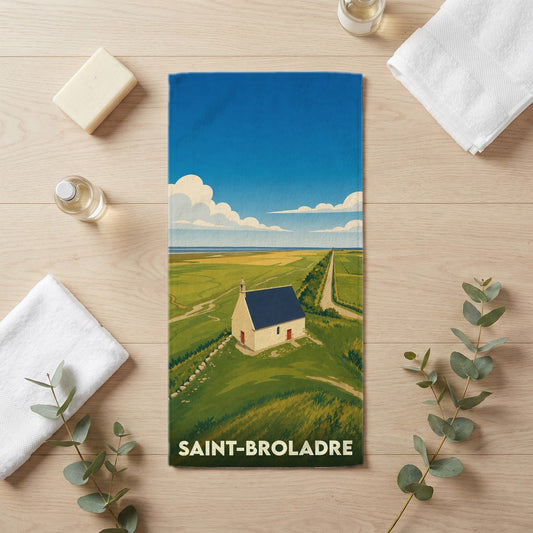 Serviette de bain souvenir de la ville de Saint-Broladre avec une illustration stylisée d'une chapelle.