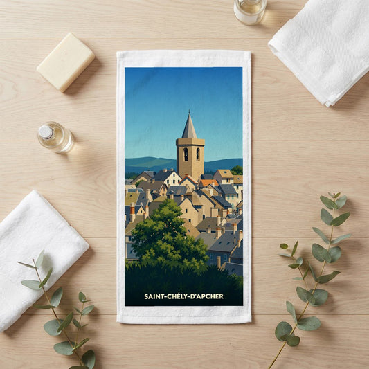 Serviette de bain souvenir de Saint-Chély-d'Apcher avec une illustration stylisée de la ville.