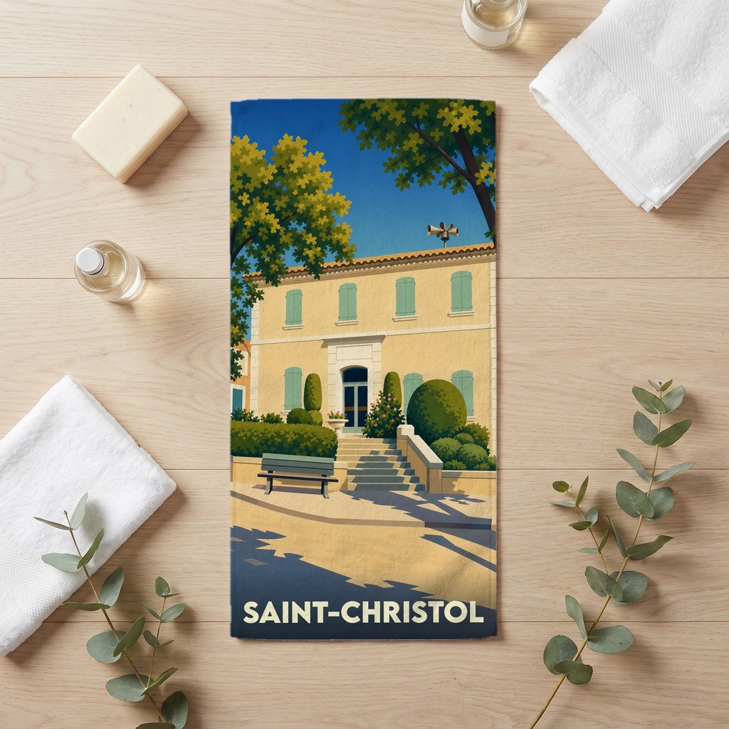 Serviette de bain souvenir de la ville de Saint-Christol avec une illustration stylisée.