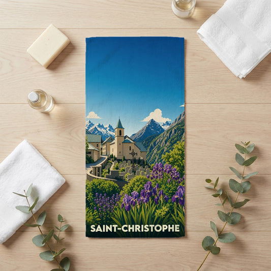 Serviette de bain souvenir de la ville de Saint-Christophe avec une illustration stylisée de montagne.
