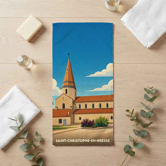 Serviette de bain souvenir de Saint-Christophe-en-Bresse illustrée d'une église de style rétro.