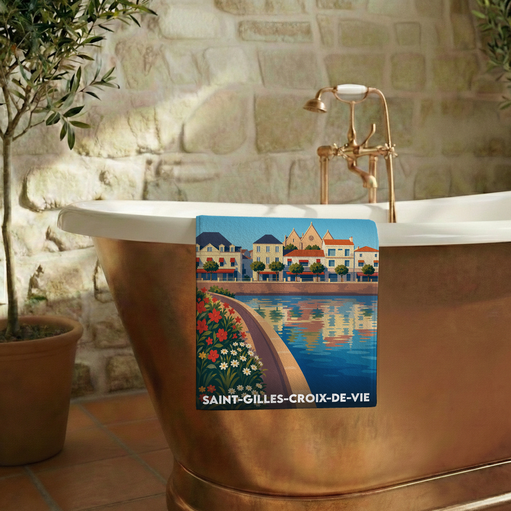 Serviette de bain souvenir de Saint-Gilles-Croix-de-Vie avec une illustration stylisée du port et de la ville.