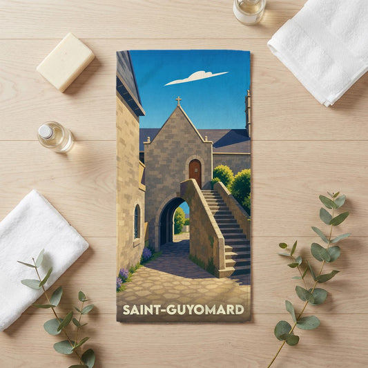 Serviette de bain souvenir de la ville de Saint-Guyomard avec une illustration stylisée.