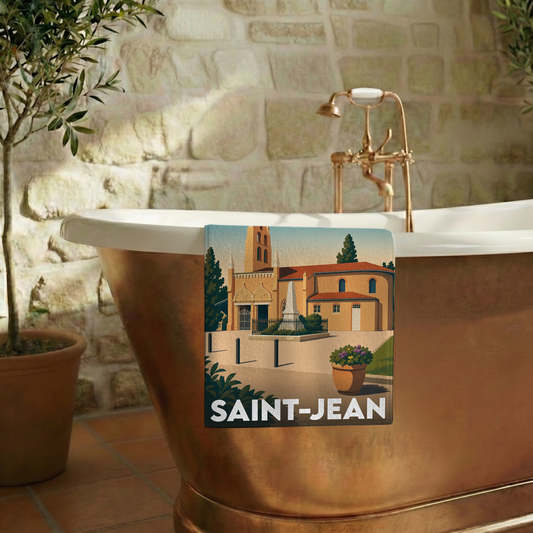 Serviette de bain souvenir de la ville de Saint-Jean avec une illustration stylisée d'une église locale.