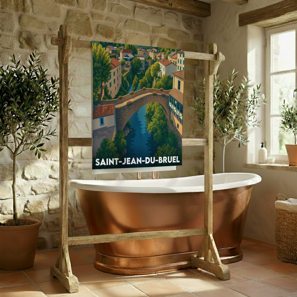 Serviette de bain souvenir de la ville de Saint-Jean-du-Bruel avec une illustration stylisée.