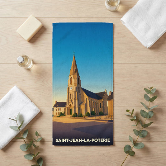 Serviette de bain souvenir de Saint-Jean-la-Poterie avec une illustration stylisée de son église.