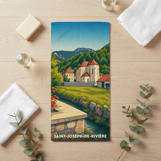 Serviette de bain souvenir de la ville de Saint-Joseph-de-Rivière avec une illustration stylisée.