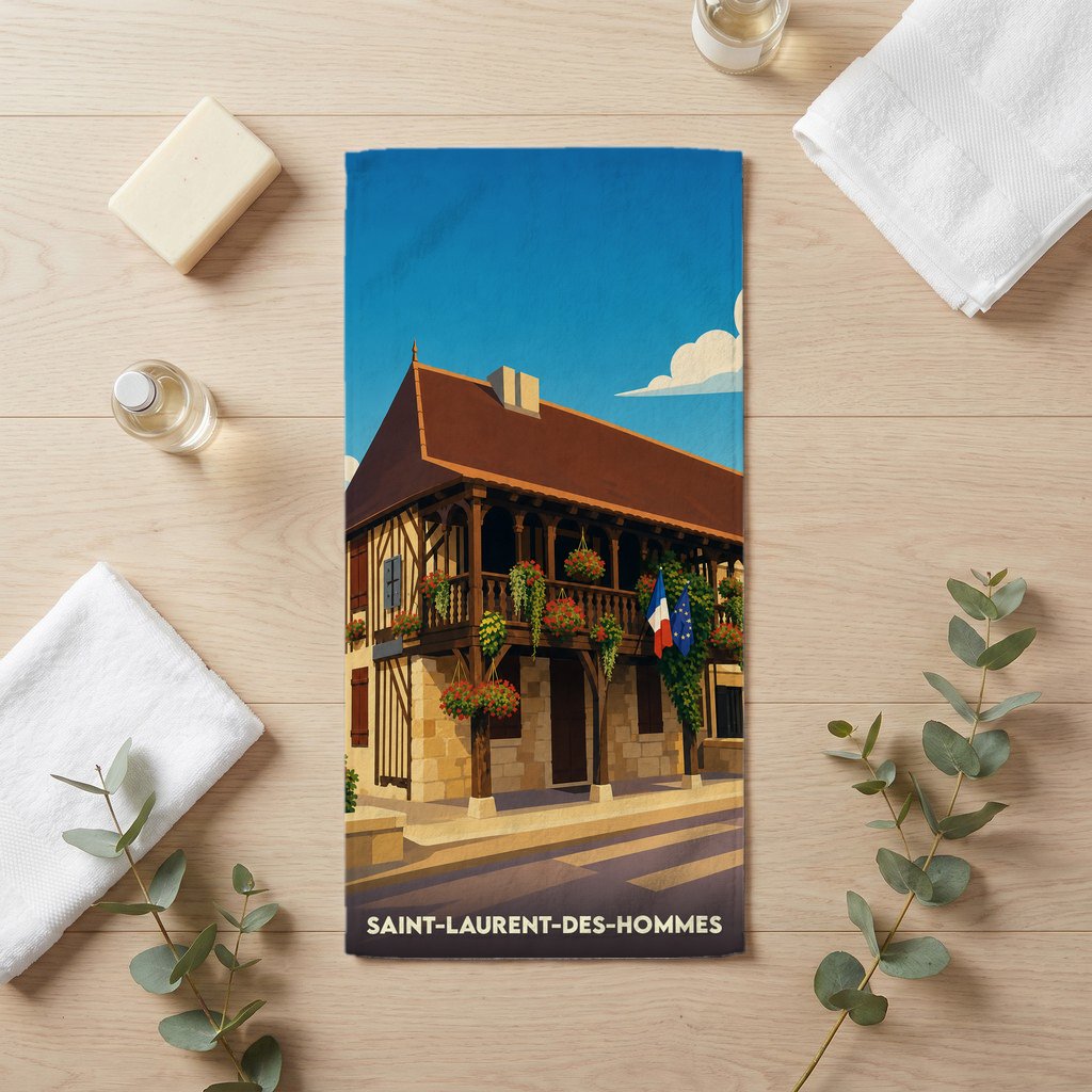 Serviette de bain souvenir de Saint-Laurent-des-Hommes avec une illustration stylisée d'un bâtiment traditionnel.