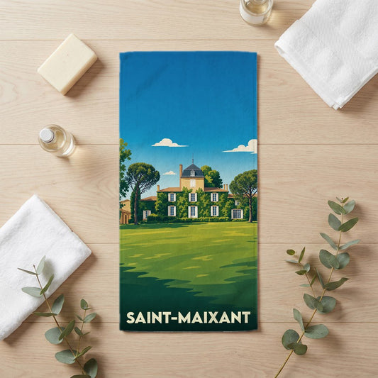 Serviette de bain souvenir de la ville de Saint-Maixant avec une illustration stylisée d'un domaine viticole.