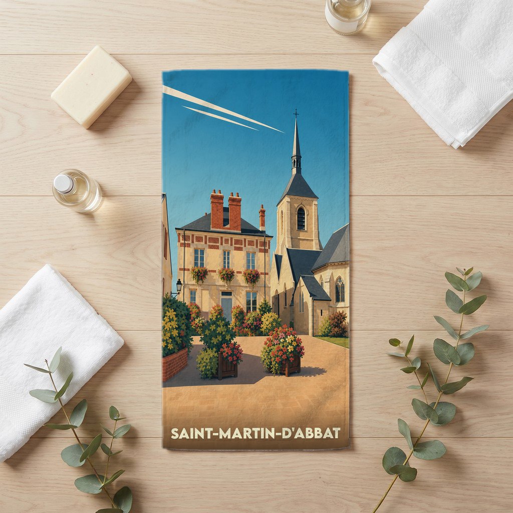 Serviette de bain souvenir de la ville de Saint-Martin-d'Abbat avec une illustration stylisée.