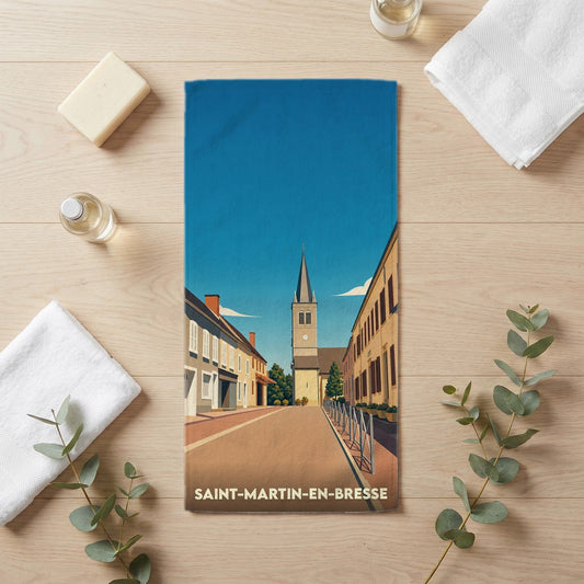 Serviette de bain souvenir de Saint-Martin-en-Bresse avec une illustration stylisée de son église et de ses rues.